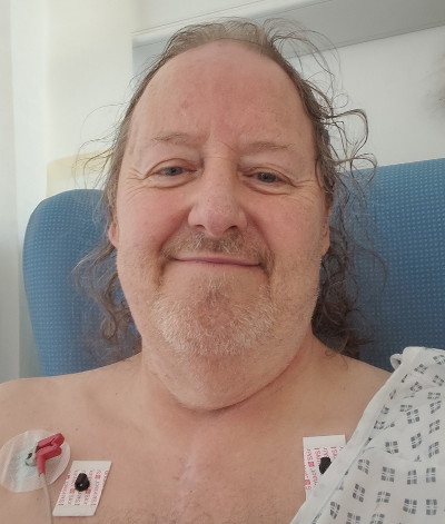 Gowned up and sort of
                                        relaxing in a chair